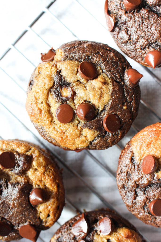 Chocolate Twist banana Muffins on metal cooling rack.