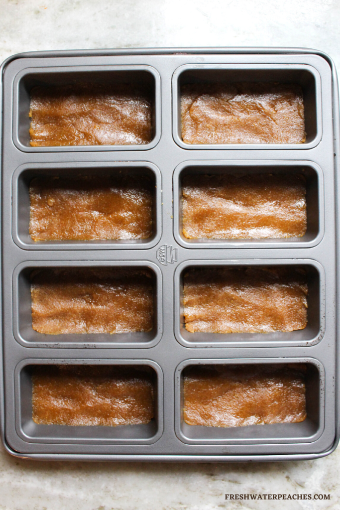 Shortbread dough in tins before being baked.