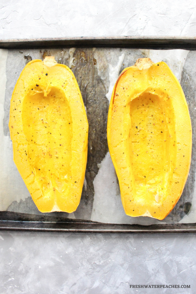 spaghetti squash flipped up after being baked.