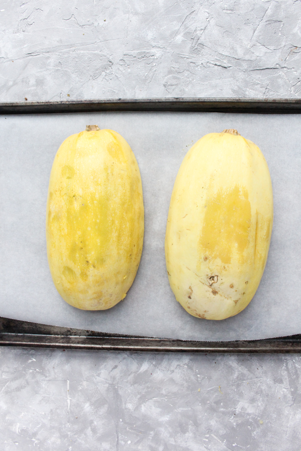 how to cook spaghetti squash - step 5 place face down on baking sheet.