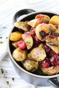 Easy roasted fall vegetables in a black serving dish.