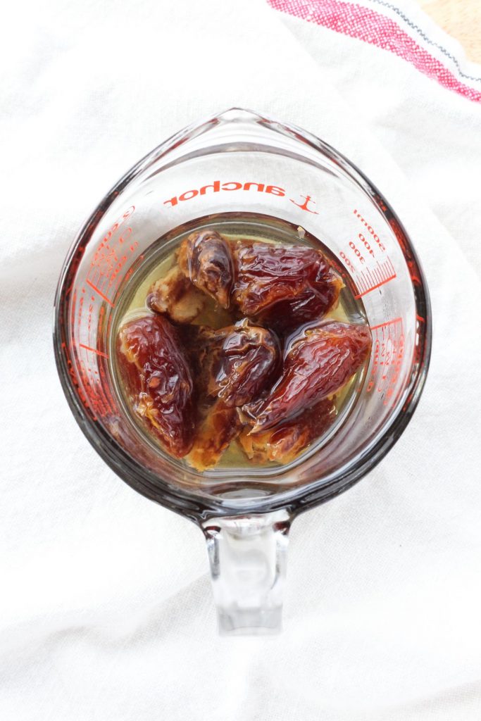 dates soaking in boiling water.