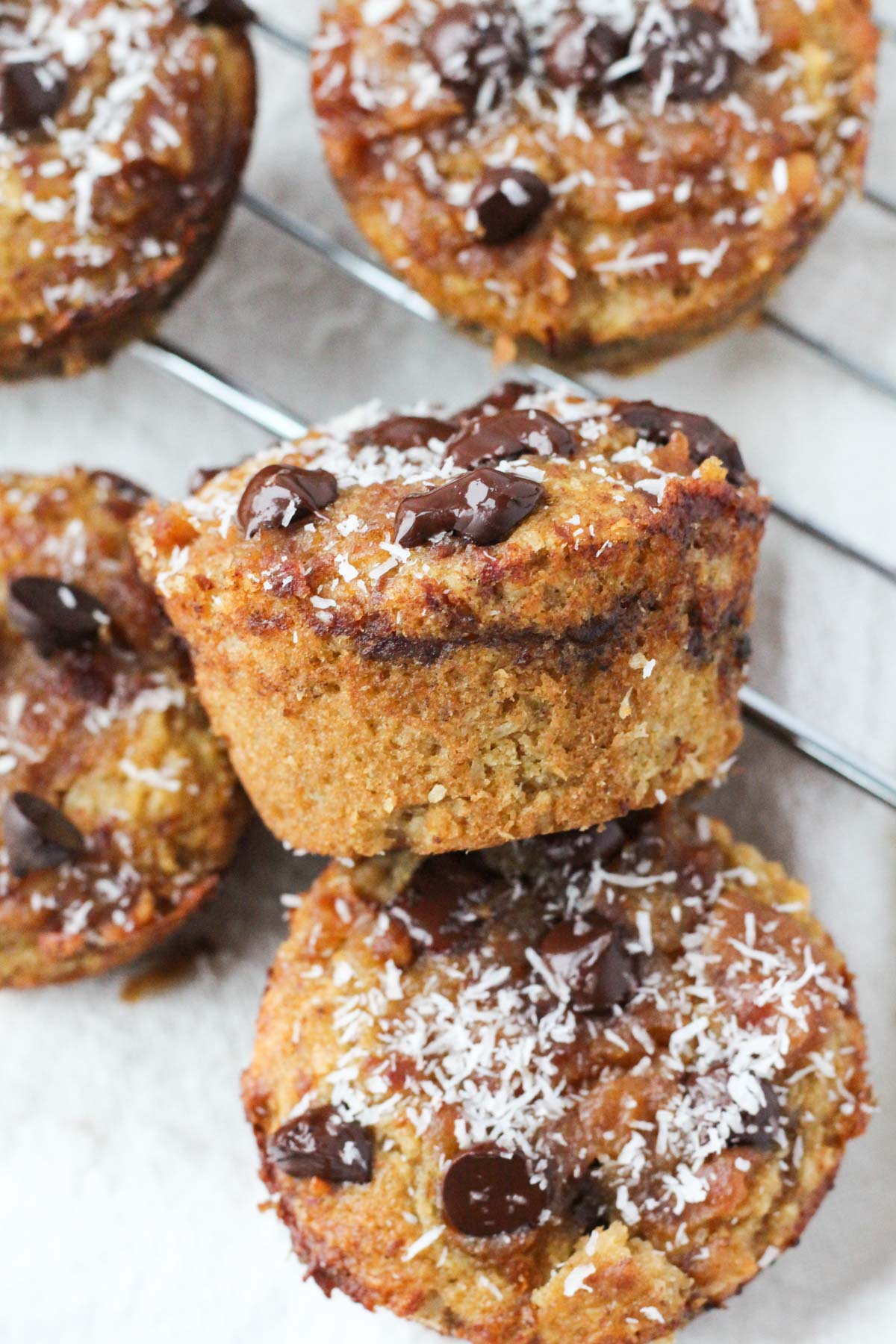 gluten-free samoa muffin tilted on its side so you can see the thick and fluffy texture.