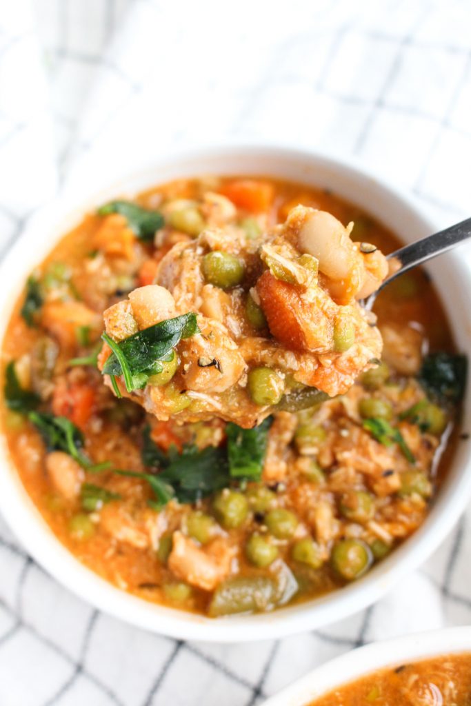 Large spoonful of healthy minestrone soup!