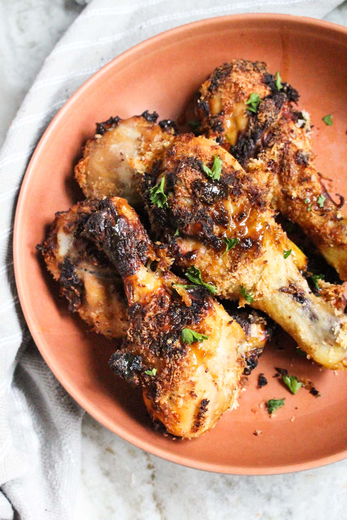 Plate full of teriyaki wings.