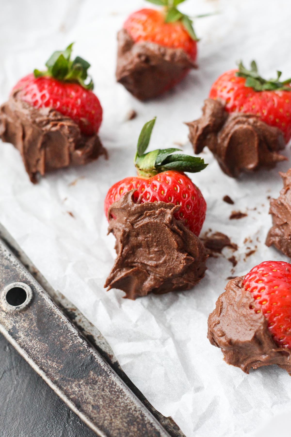 Strawberries dipped in nut free chocolate spread.