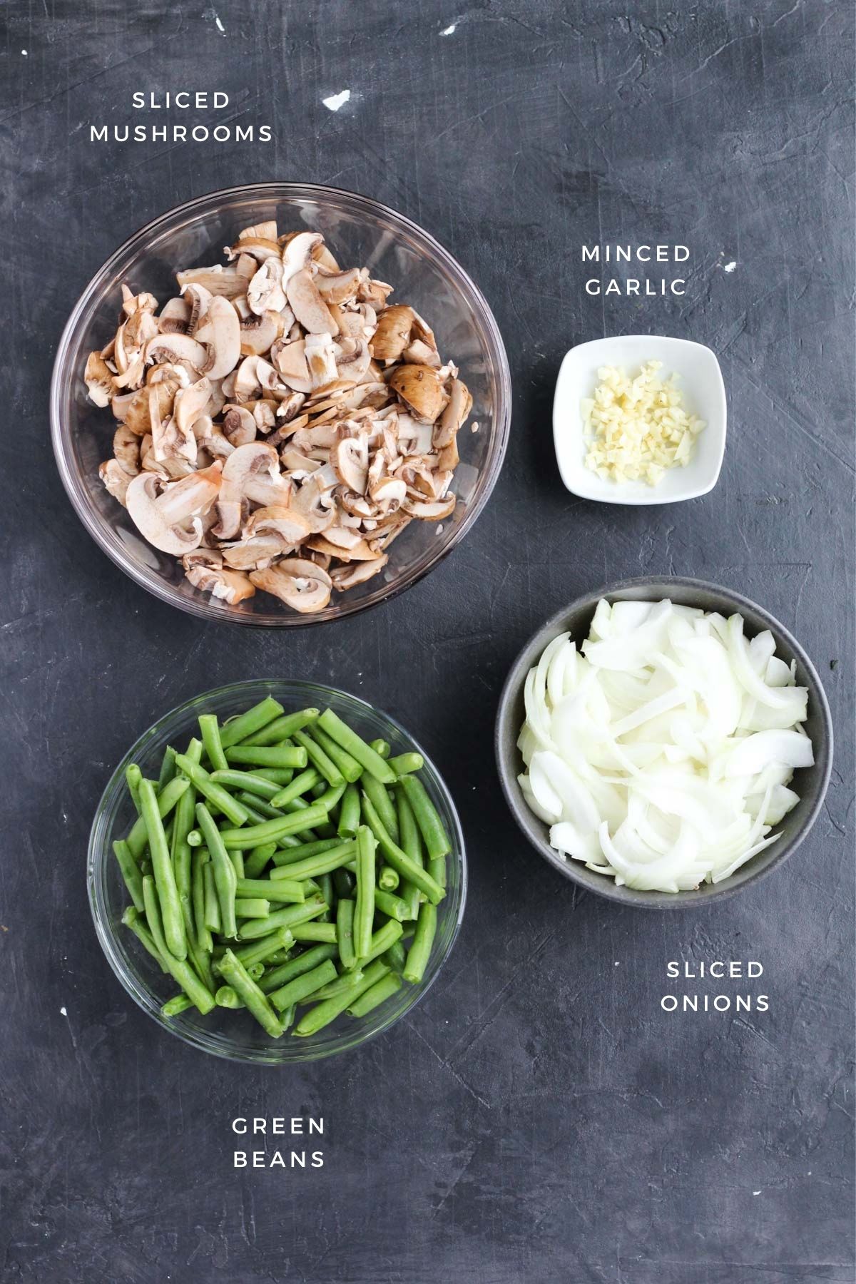 Vegetables prepared and measured out into separate bowls.