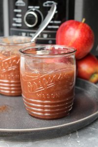 Applesauce in a small mason jar.
