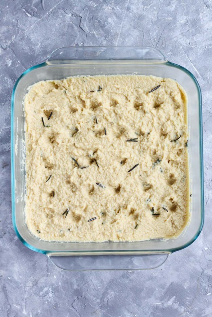 Dough in the glass baking dish before going in the oven.