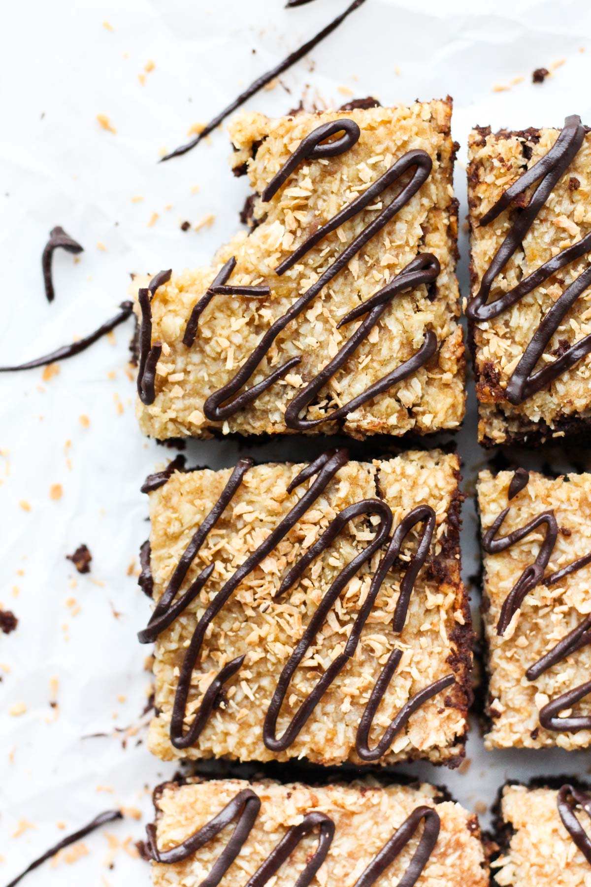 Brownies with coconut top layer and the traditional samoa chocolate drizzle on top.
