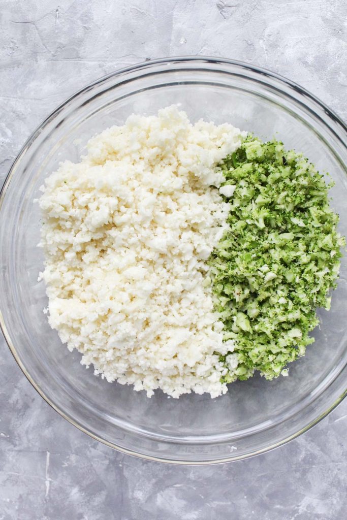 Cauliflower rice and broccoli rice in a bowl.