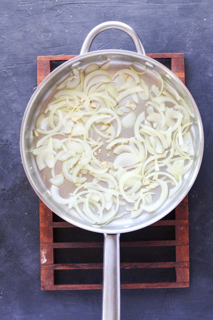 Onions and garlic in saute pan.