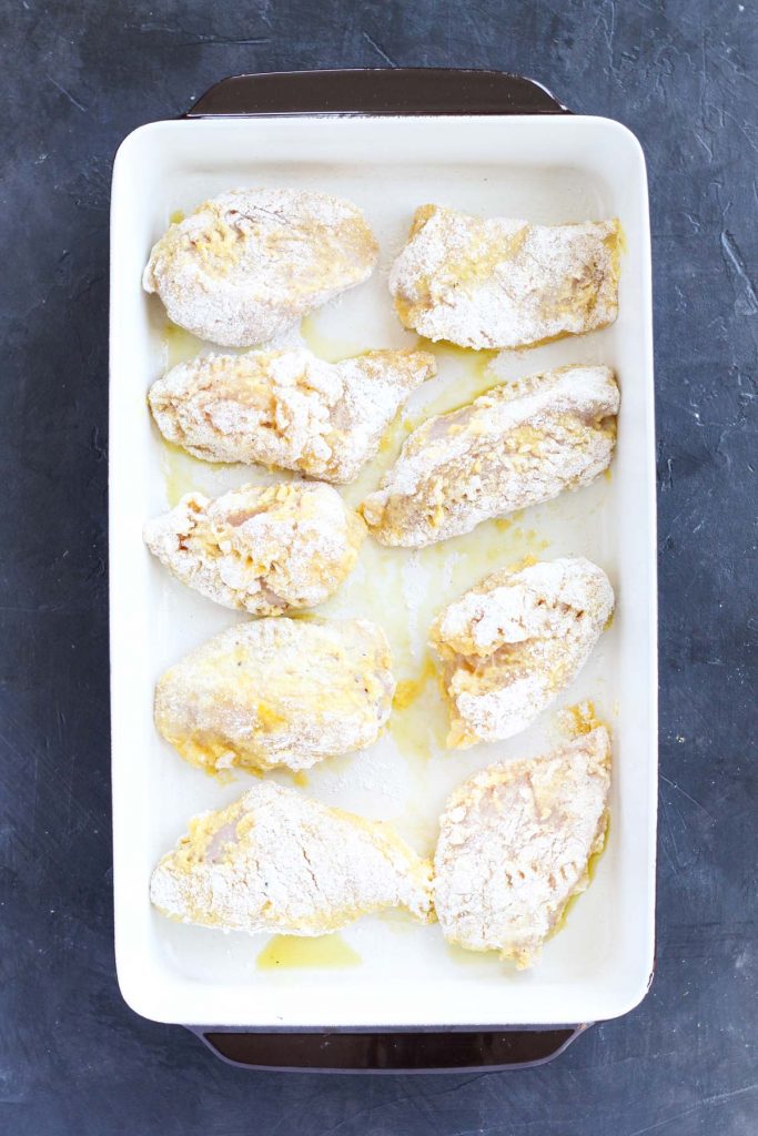 Chicken in baking dish before going in the oven.