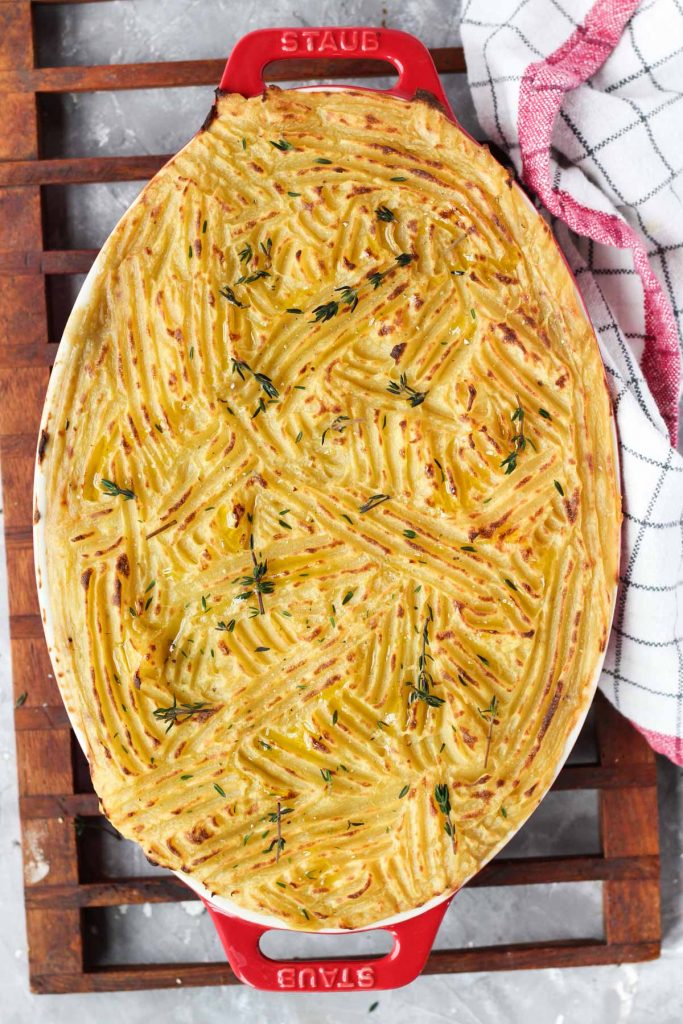 Chicken pot pie in casserole dish fresh out of the oven.