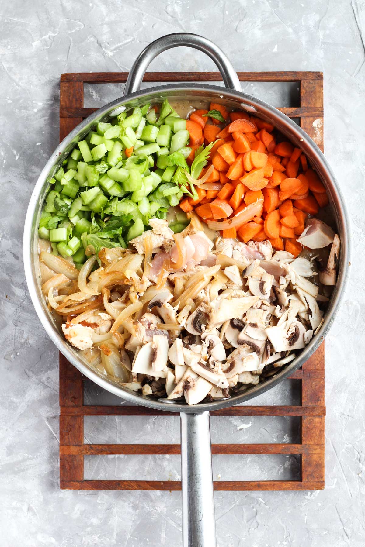 Chopped vegetables with sauce in the pan.