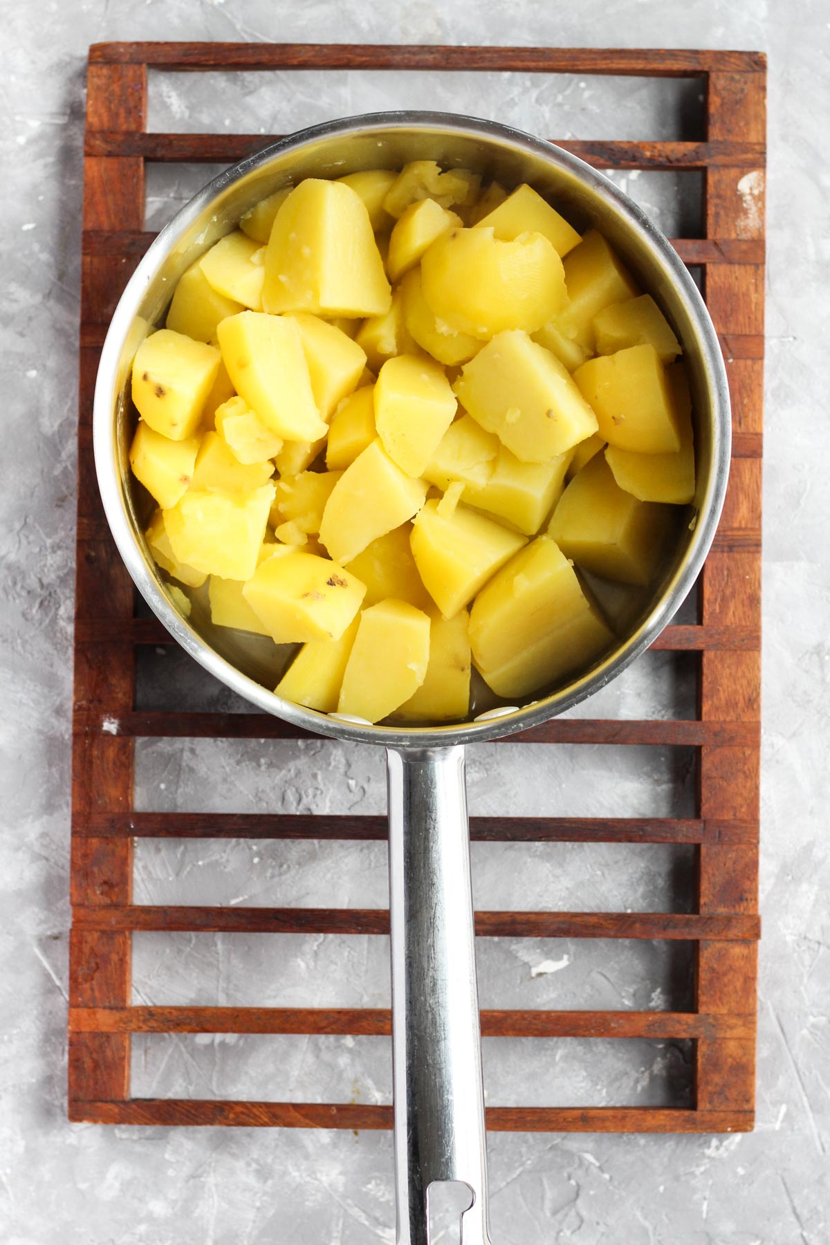 Steamed potatoes in a pot.
