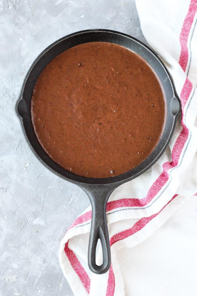 Cake batter in the skillet before baking.