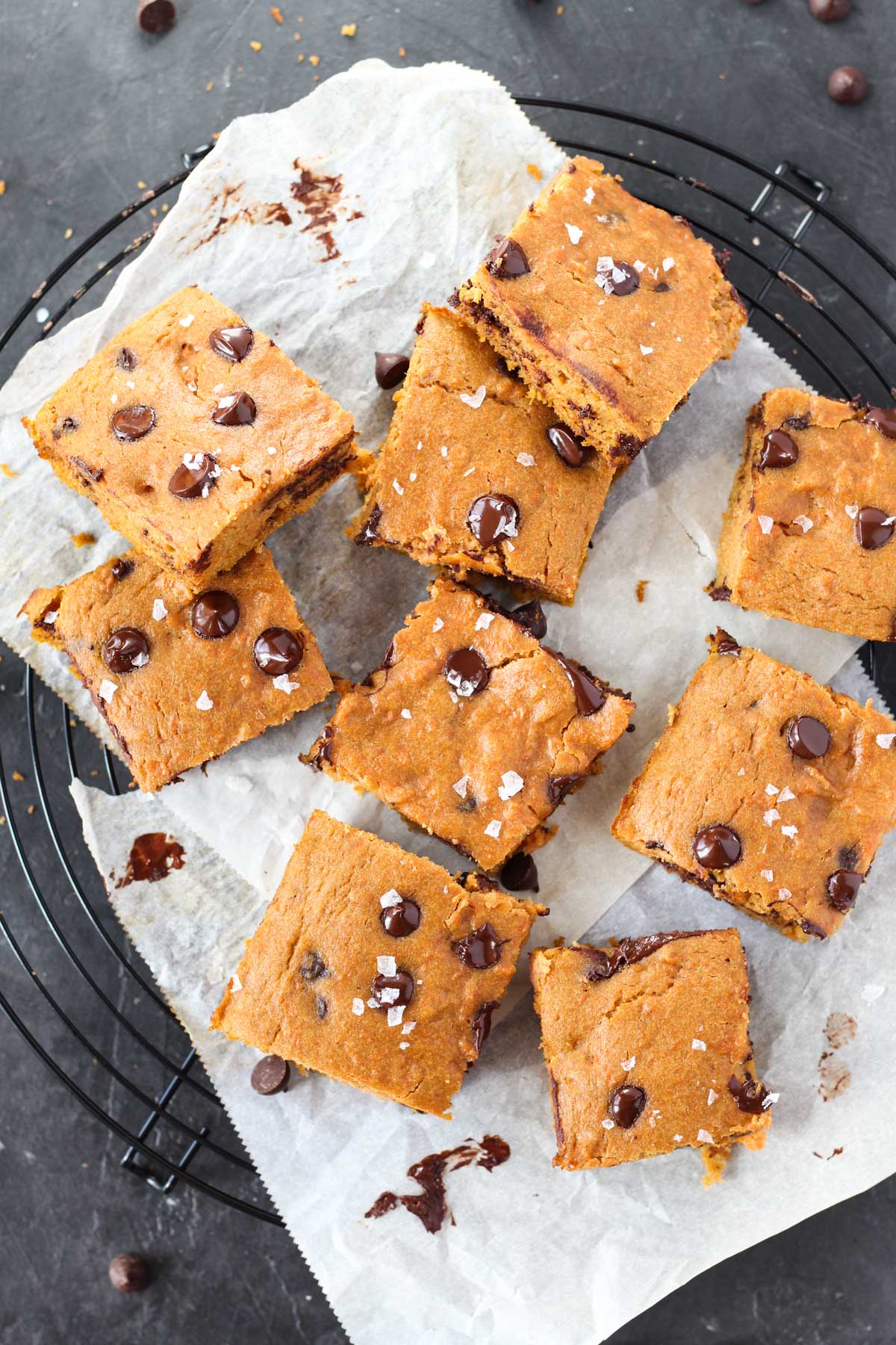 Overhead shot of cookie bars on parchment paper.