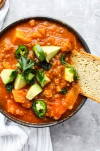 Chili topped with jalapenos and avocado.