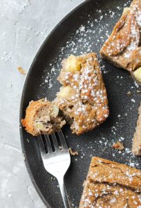 Overhead shot of apple cake on a plate.