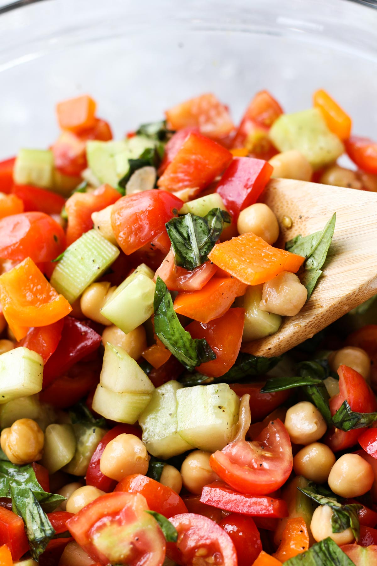 Spoon scooping out salad.