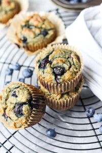 Muffins leaning on top of each other.