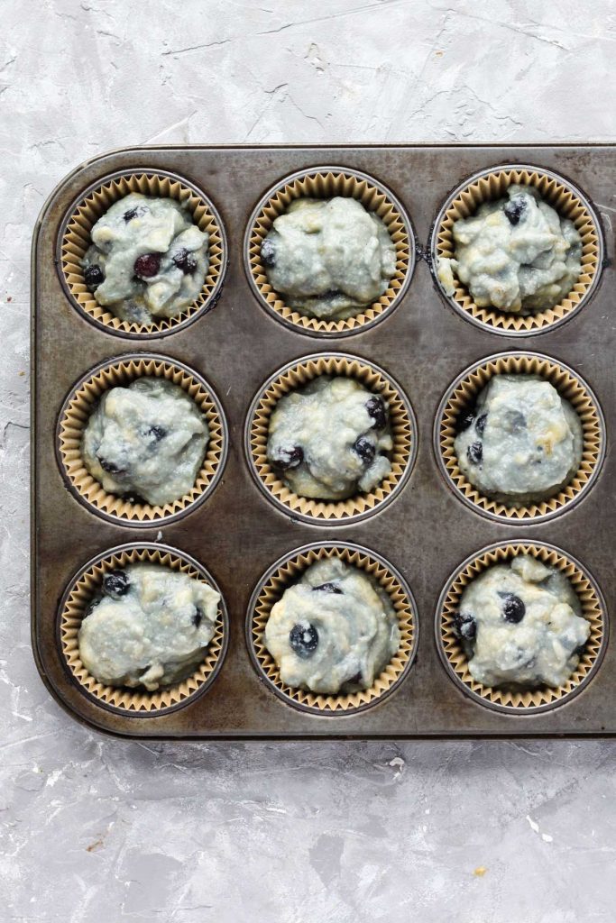 Muffins in pan before baking.