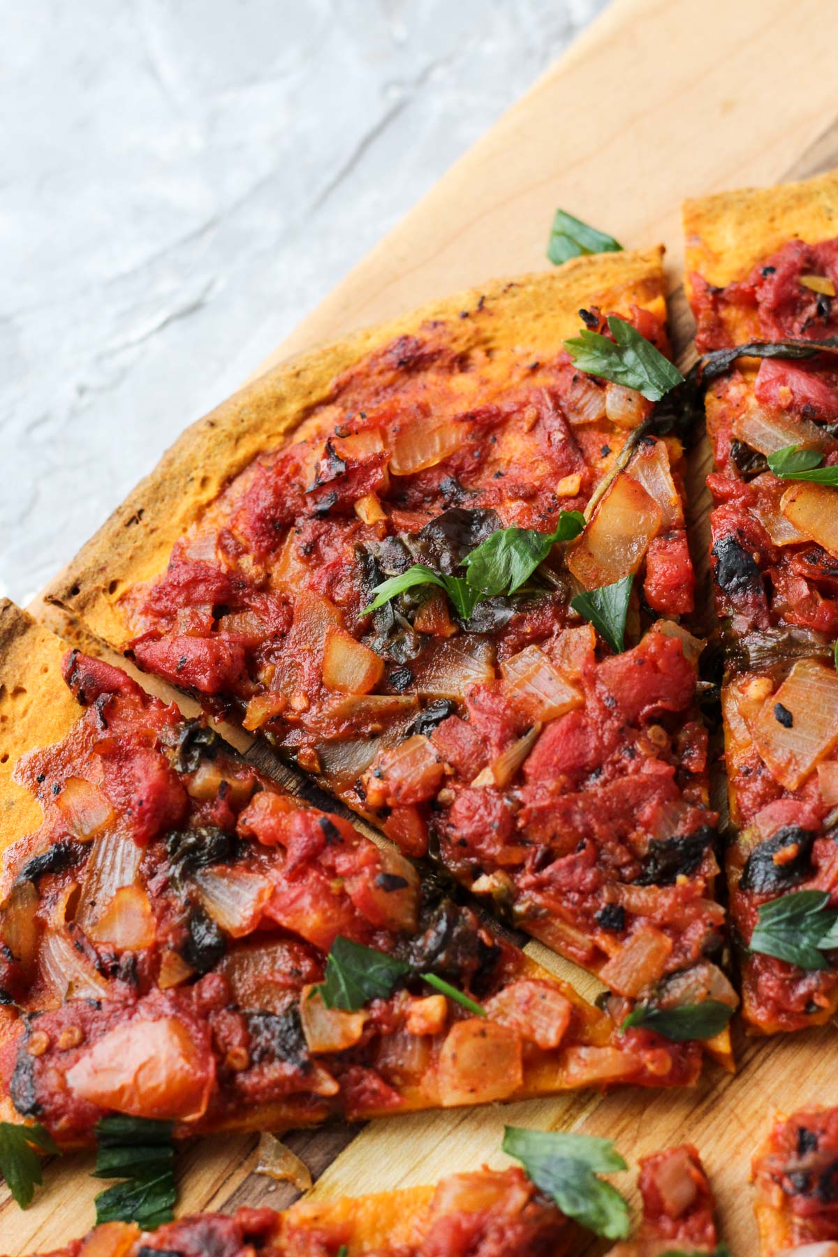 Close up shot of slice of pizza.