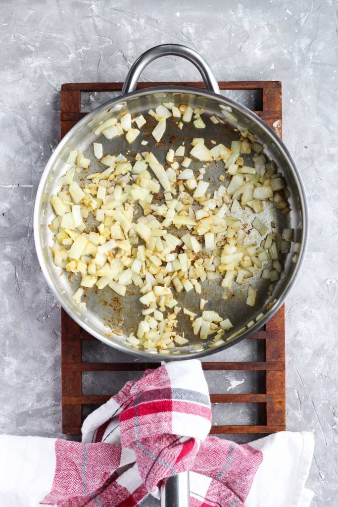 Onions and garlic in pan.