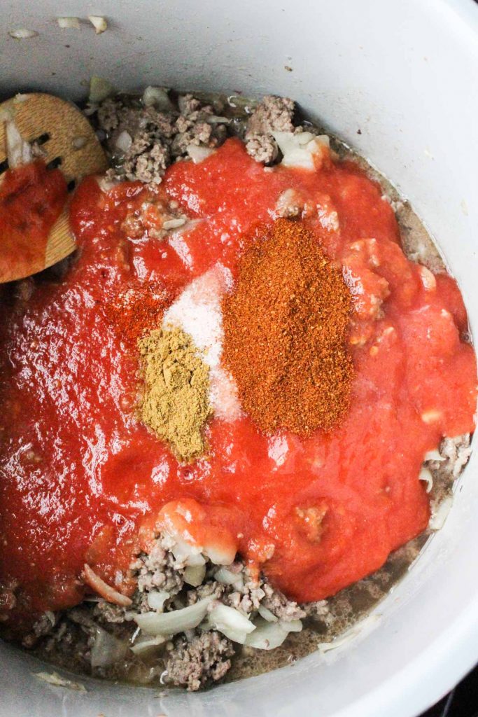 Sauce and spices added to meat.