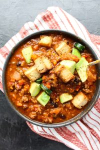 Overhead shot of veggie loaded chili.