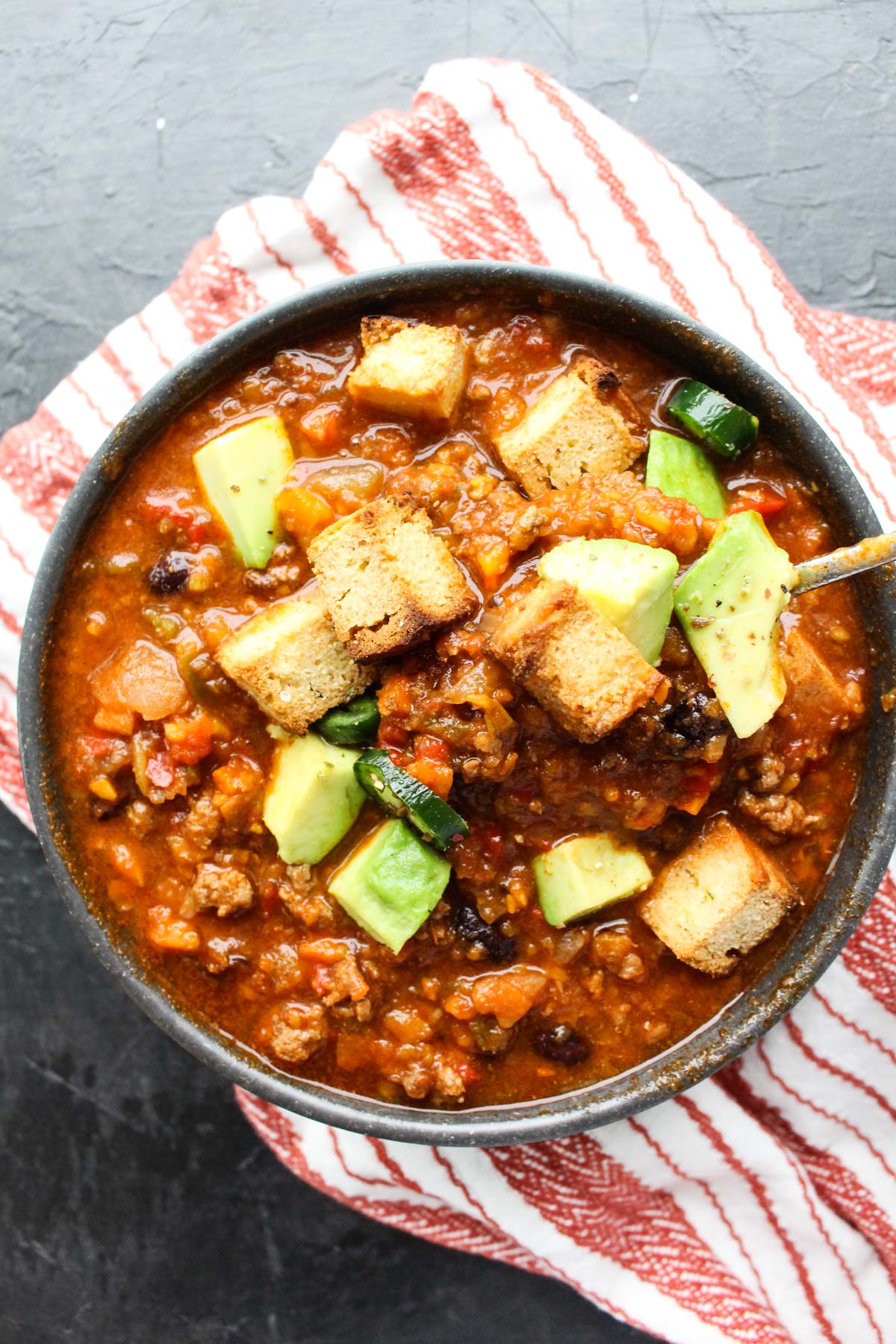 Overhead shot of veggie loaded chili.