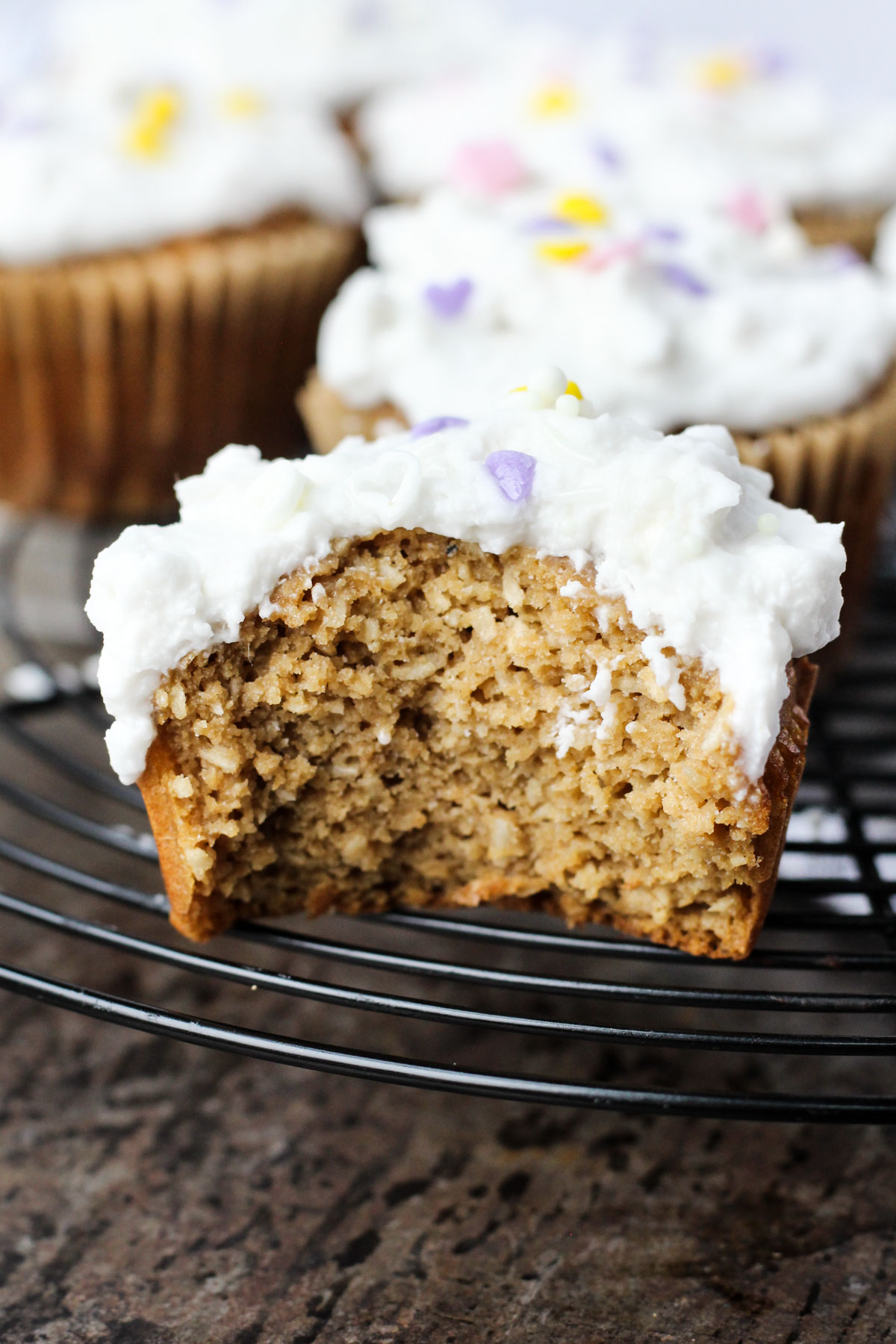 Bite shot of coconut cupcakes.