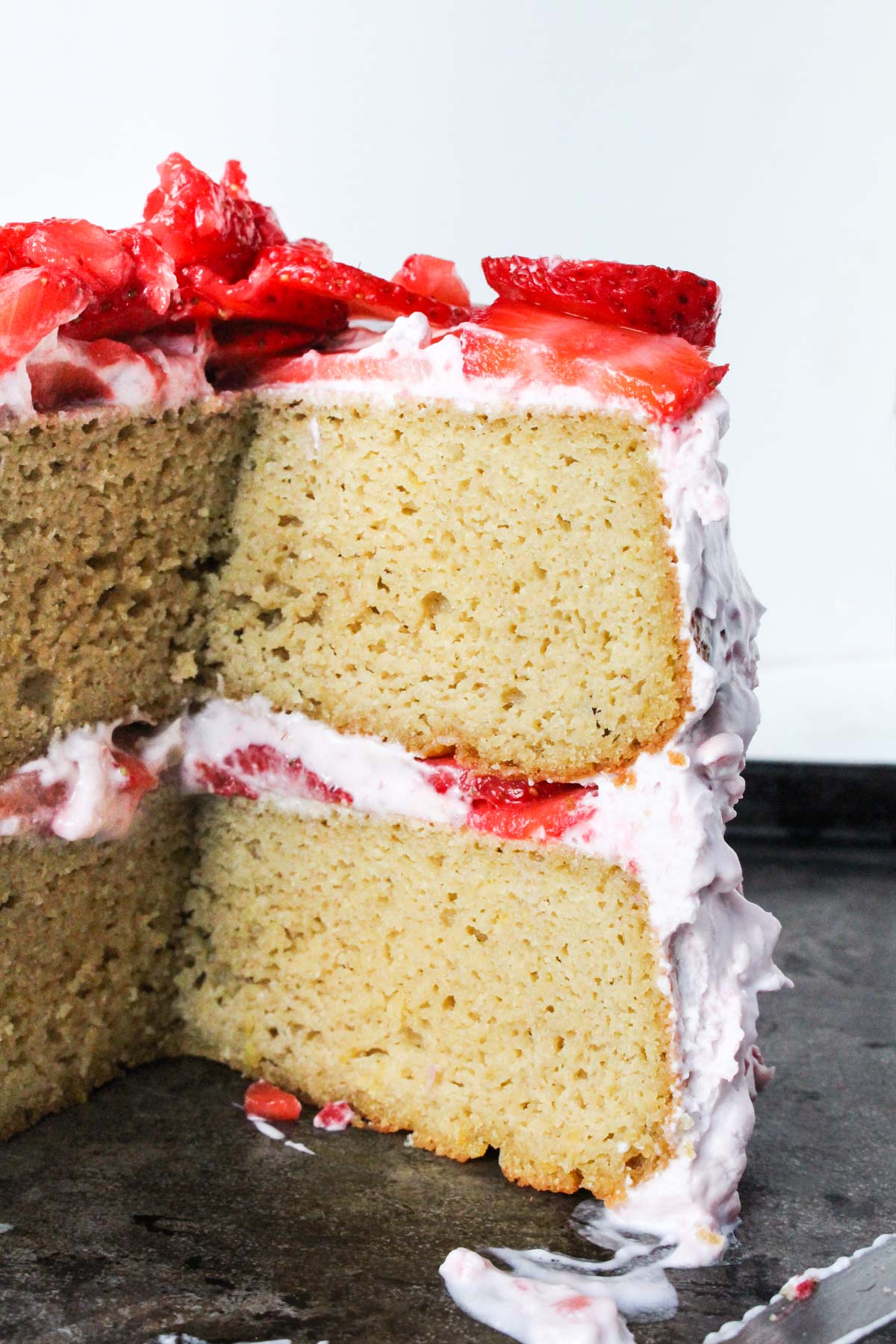 Inside shot of lemon cake so you can see the layers with frosting.