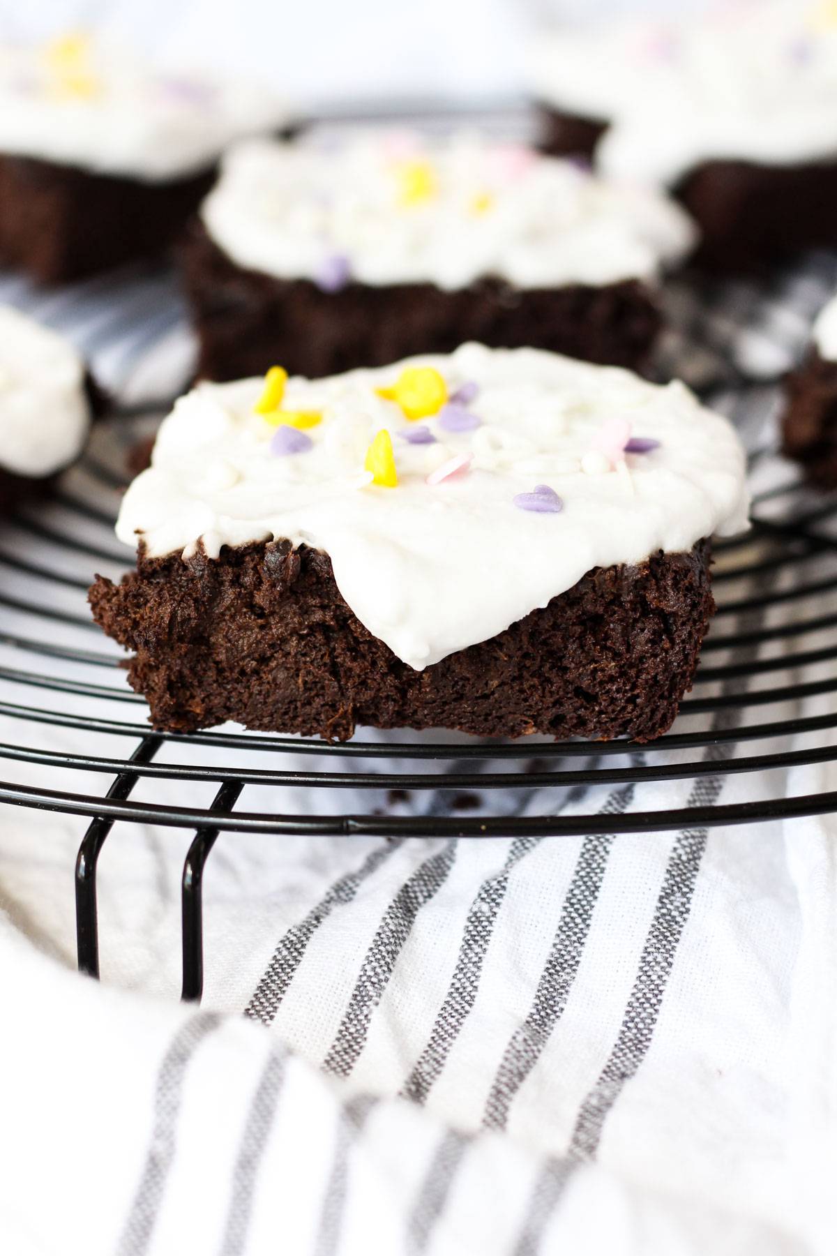Brownie on a metal cooling rack.