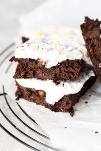 Sweet potato brownies stacked on top of each other.
