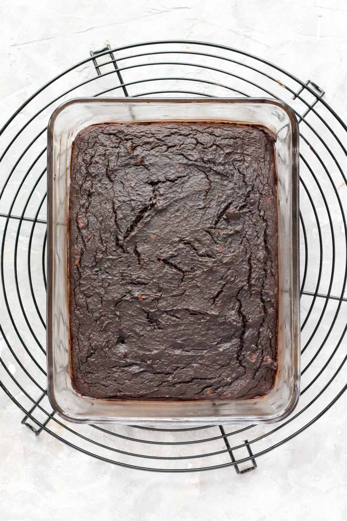 Brownies in glass dish after being baked.