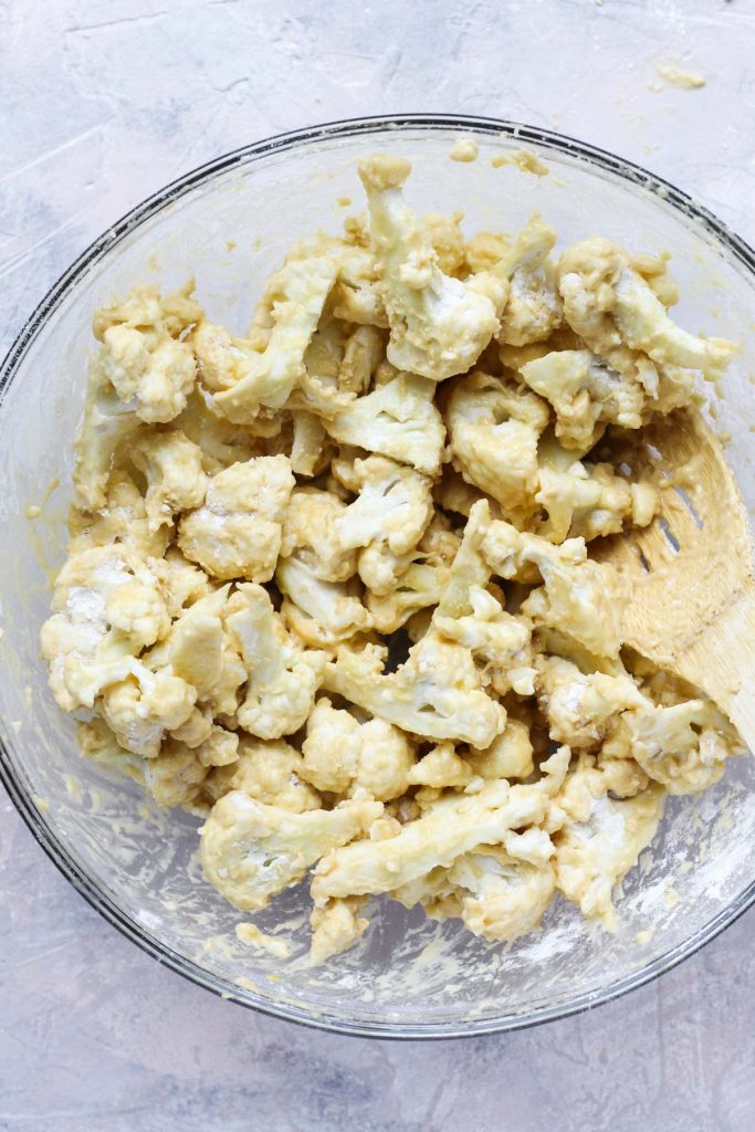 Flour stirred into cauliflower and egg mixture.