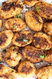 Plate full of crispy sweet potato tots.