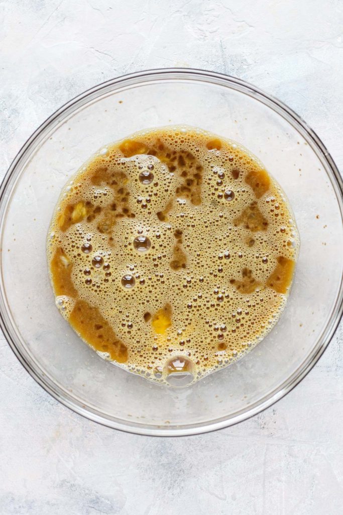 Wet ingredients mixed in a bowl.
