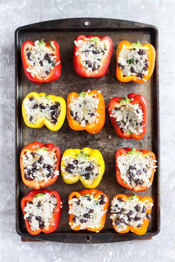 Stuffed bell peppers before being grilled.