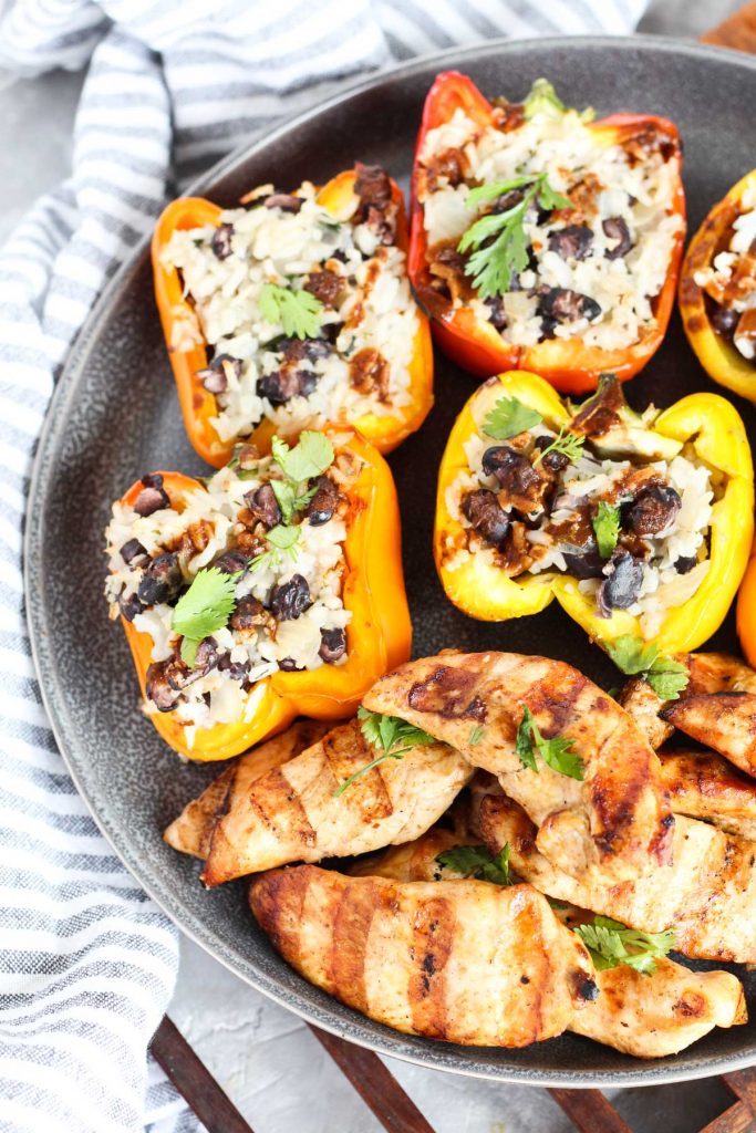 Peppers and chicken on serving plate.