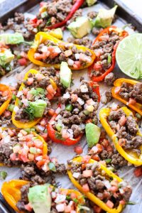 Pepper nachos on a baking sheet.