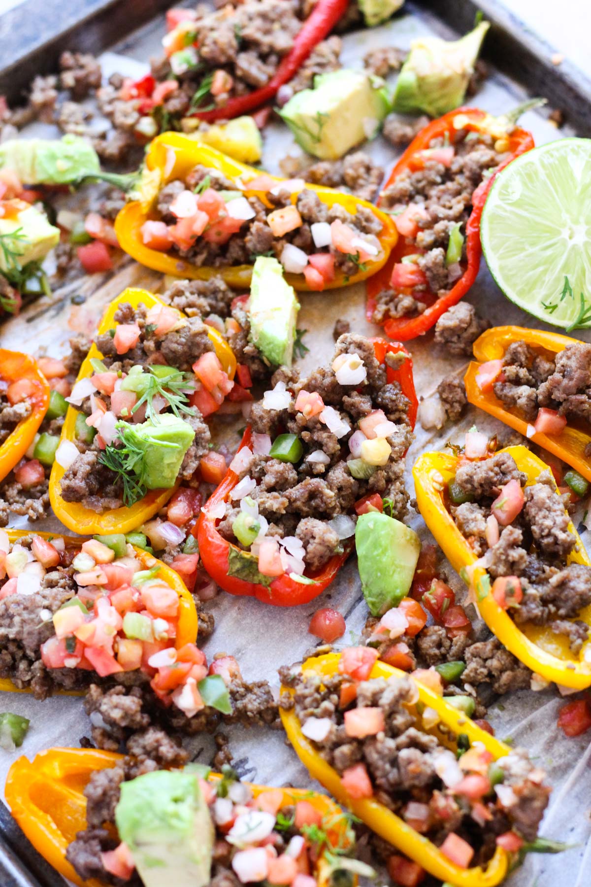 Pepper nachos on a baking sheet.