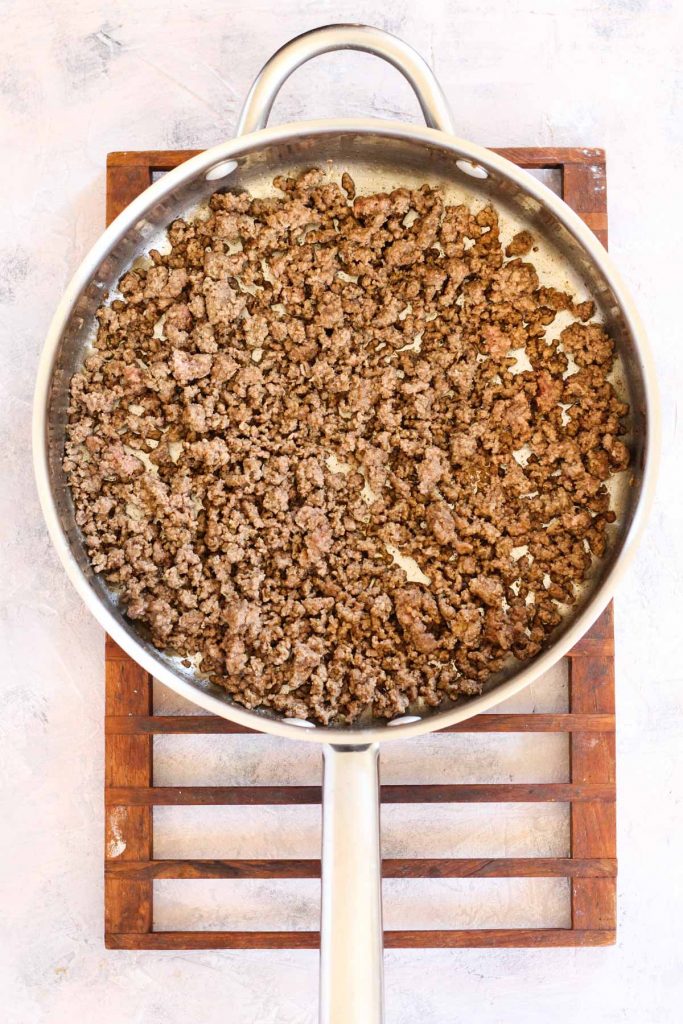 Meat mixture in frying pan.