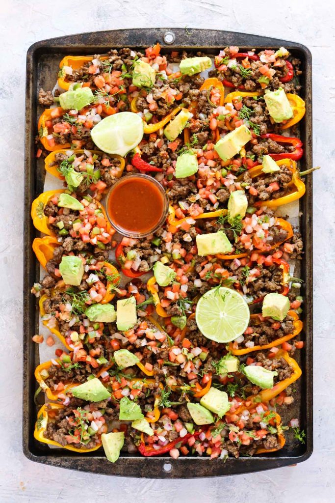 Baked stuffed peppers with toppings.