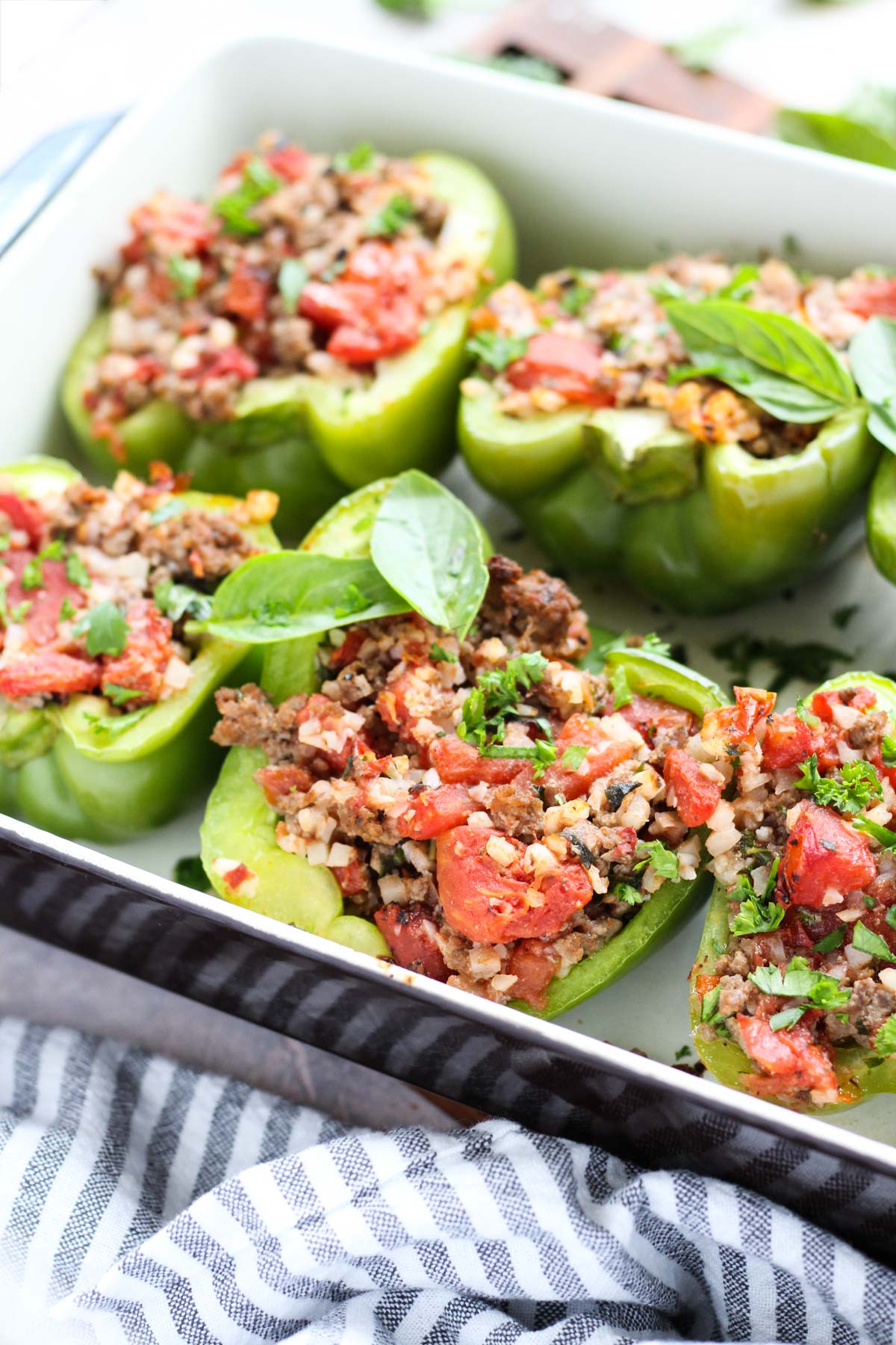 Stuffed peppers in a casserole dish.