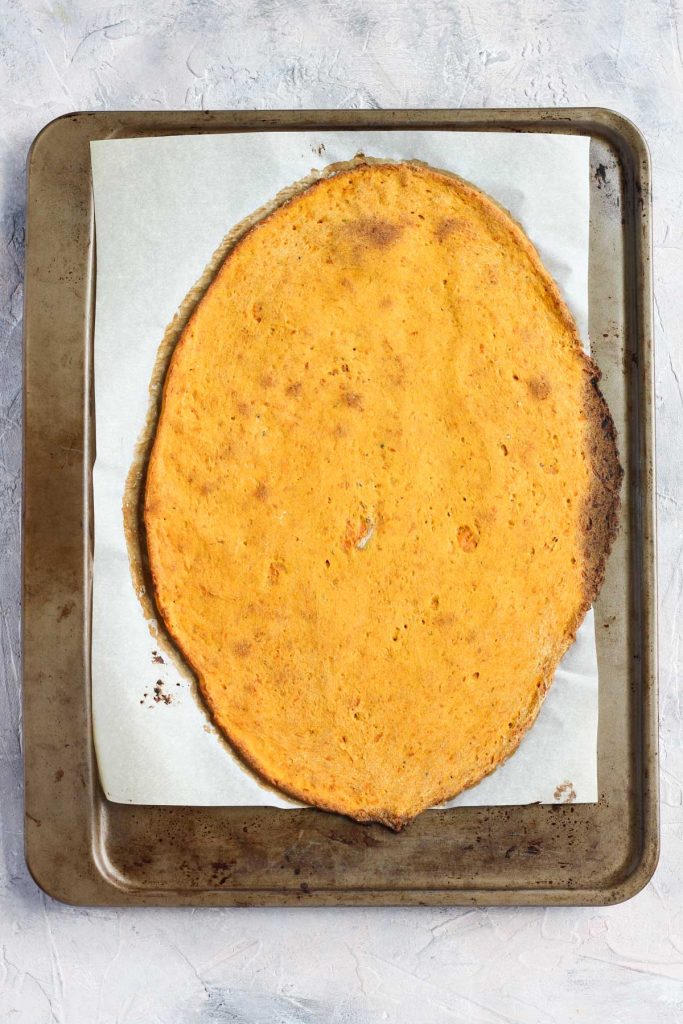 Pizza crust with golden brown edges.