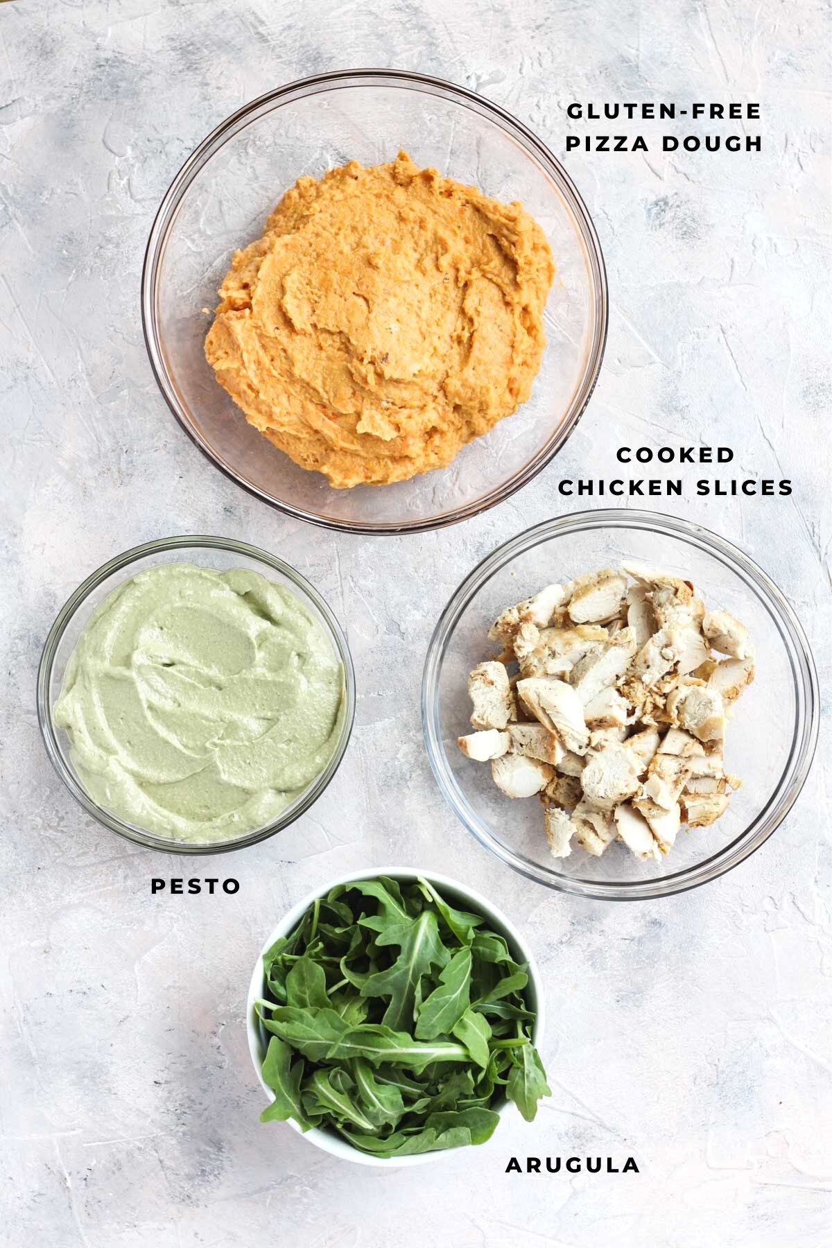 Overhead shot of ingredients in glass bowls.