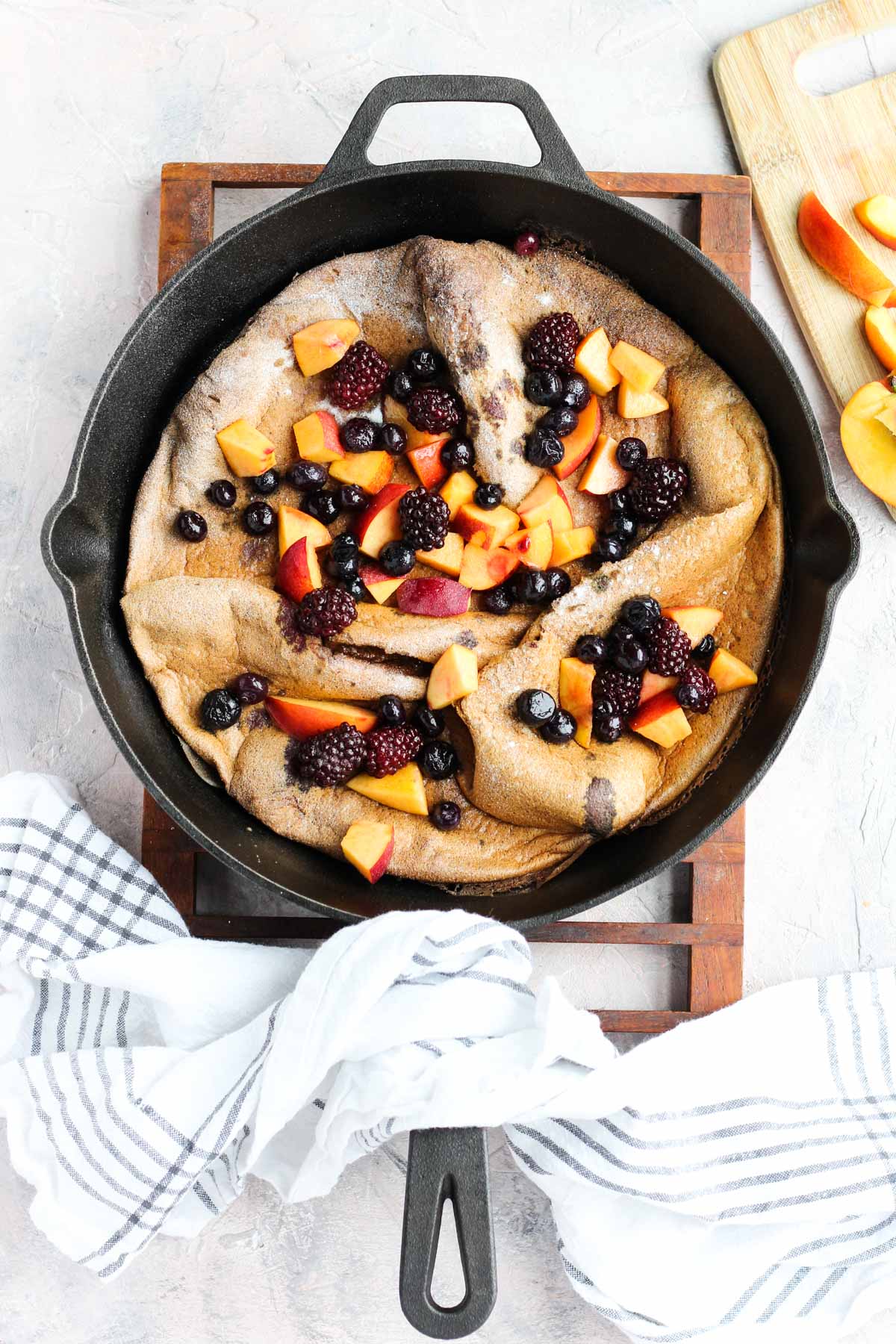 Overhead shot of the dutch baby in a cast iron skillet.